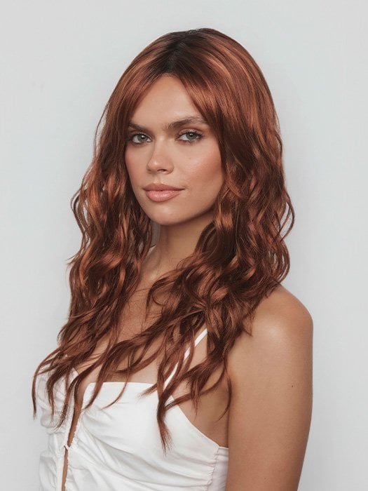Model is wearing PHILLIPA by RENE OF PARIS in color CAFE ROUGE R | A dimensional auburn copper blend with rich reddish-brown roots melting into warm copper highlights