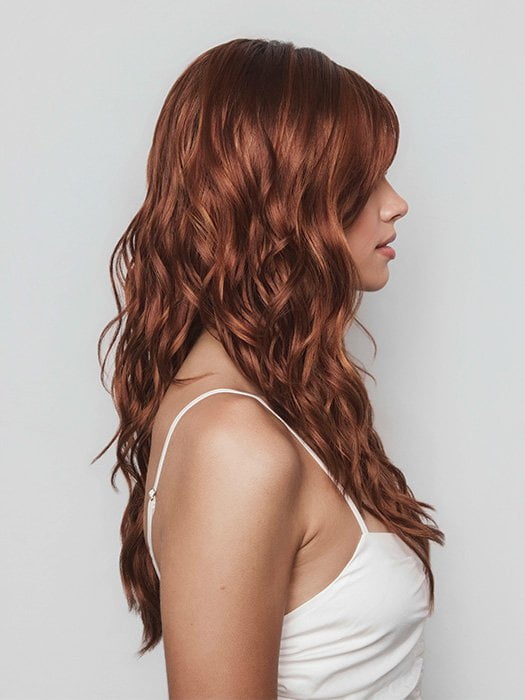 Model is wearing PHILLIPA by RENE OF PARIS in color CAFE ROUGE R | A dimensional auburn copper blend with rich reddish-brown roots melting into warm copper highlights