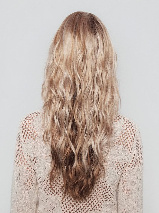 Model is wearing PHILLIPA by RENE OF PARIS in color WINTER OAT LATTE R | rooted honey blonde and platinum blonde blend with soft, dimensional highlights and lowlights