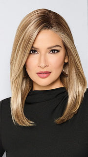 Model is wearing BOX OFFICE BEAUTY by RAQUEL WELCH in color SS1621 SHADED SAND | Light Blonde shaded with Medium Brown