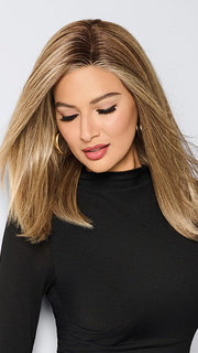 Model is wearing BOX OFFICE BEAUTY by RAQUEL WELCH in color SS1621 SHADED SAND | Light Blonde shaded with Medium Brown