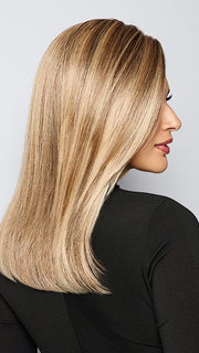 Model is wearing BOX OFFICE BEAUTY by RAQUEL WELCH in color SS1621 SHADED SAND | Light Blonde shaded with Medium Brown
