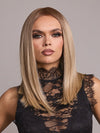 Model is wearing SLOAN by RENE OF PARIS in color BUTTER BISCUIT BLOND | Soft, Pale Chocolate Root that melts into a blend of Buttery and Biscuit Blonde tones