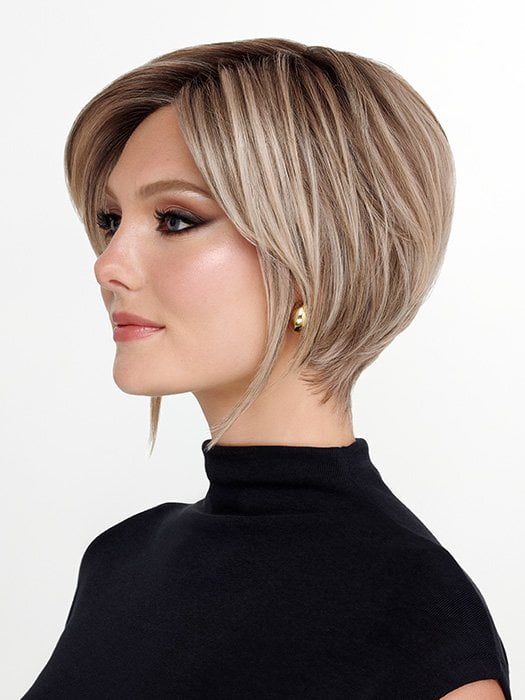 Model is wearing THE ROUGE by TRESSALLURE in color 36/25/23/R6 MOON DUST | Dark salt and pepper base with blended golden blonde and cool platinum tones, shaded with Dark Roots