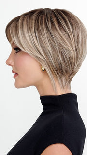 Model is wearing THE ROUGE by TRESSALLURE in color 36/25/23/R6 MOON DUST | Dark salt and pepper base with blended golden blonde and cool platinum tones, shaded with Dark Roots