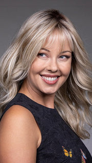 Model is wearing VESPER by BELLETRESS in color BUTTERBEER R | Dark Brown Base and Root that transitions smoothly into a buttery blonde, infused with creamy honey and toffee tones