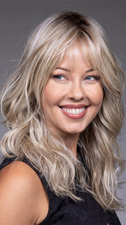 Model is wearing VESPER by BELLETRESS in color BUTTERBEER R | Dark Brown Base and Root that transitions smoothly into a buttery blonde, infused with creamy honey and toffee tones
