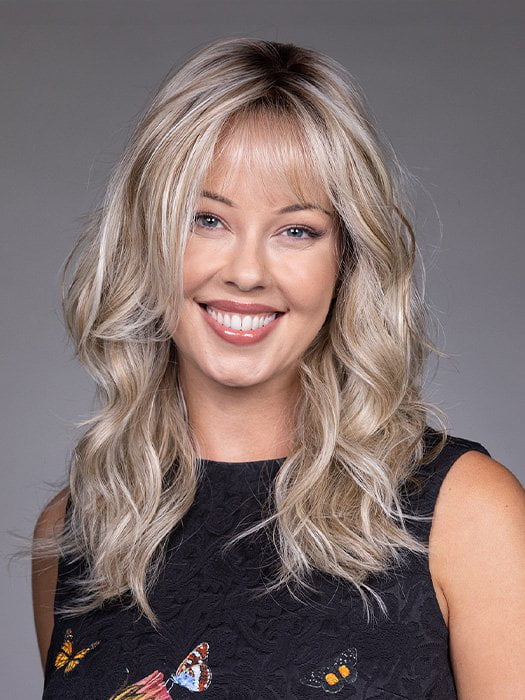 Model is wearing VESPER by BELLETRESS in color BUTTERBEER R | Dark Brown Base and Root that transitions smoothly into a buttery blonde, infused with creamy honey and toffee tones