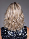 Model is wearing VIVIENNE by BELLETRESS in color BUTTERBEER R | Dark Brown Base and Root that transitions smoothly into a buttery blonde, infused with creamy honey and toffee tones