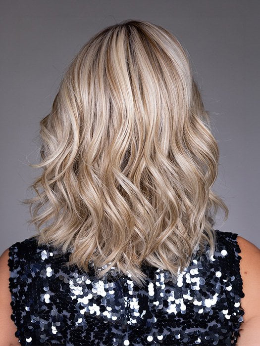 Model is wearing VIVIENNE by BELLETRESS in color BUTTERBEER R | Dark Brown Base and Root that transitions smoothly into a buttery blonde, infused with creamy honey and toffee tones
