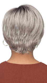 Model is wearing VESPER by ESTETICA in color CHROMERT1B | Gray & White with 25% Medium Brown Blend & Off-Black Roots