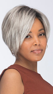 Model is wearing VESPER by ESTETICA in color CHROMERT1B | Gray & White with 25% Medium Brown Blend & Off-Black Roots