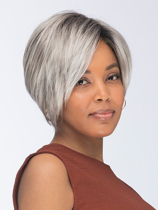 Model is wearing VESPER by ESTETICA in color CHROMERT1B | Gray & White with 25% Medium Brown Blend & Off-Black Roots
