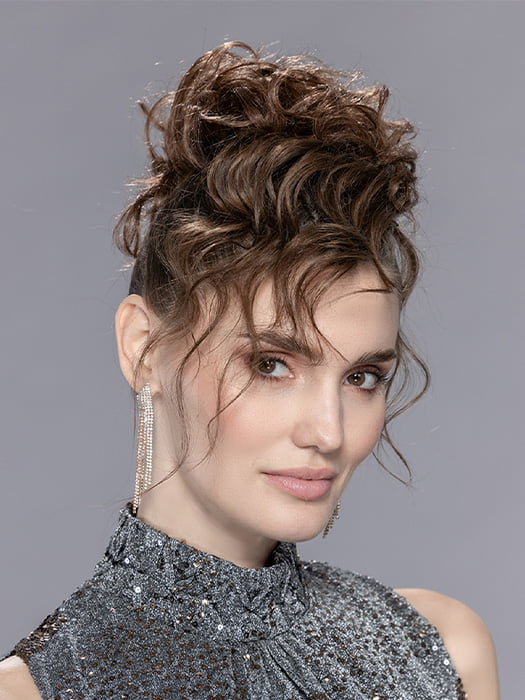 Model is wearing ICE by ELLEN WILLE in color CHOCOLATE-MIX | Medium Brown Blended with Light Auburn, and Dark Brown Blend
