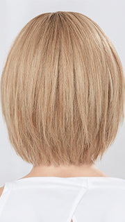 Model is wearing JADORE DELUXE in color LIGHT CHAMPAGNE ROOTED | Lightest Pale Blonde and Lightest Golden Blonde with Winter White Blend and Shaded Roots