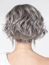 Model is wearing ROMANCE DELUXE by ELLEN WILLE in color METALLIC GREY ROOTED 60.51 | Pearl White, Darkest/Lightest Brown with Grey Blend with Shaded Roots