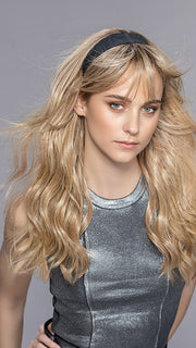 Model is wearing STEVIA by ELLEN WILLE in color SAHARA BEIGE MIX 16.22.14 | Medium Blonde and Light Neutral Blonde with Medium Ash Blonde Blend