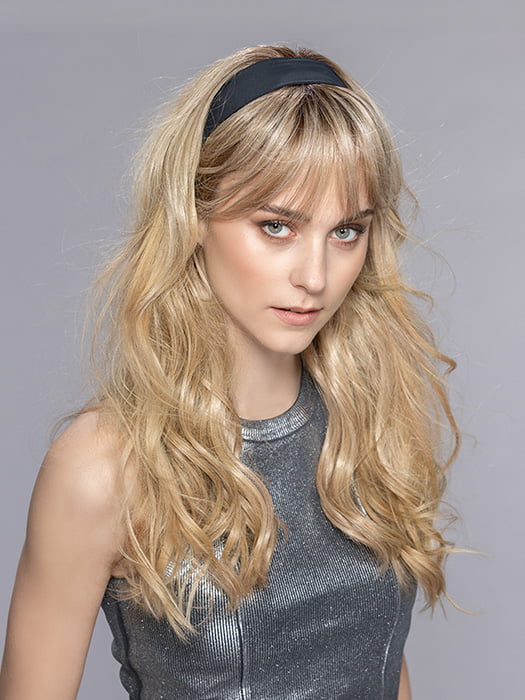 Model is wearing STEVIA by ELLEN WILLE in color SAHARA BEIGE MIX 16.22.14 | Medium Blonde and Light Neutral Blonde with Medium Ash Blonde Blend