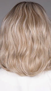 Model is wearing WINSTON in BUTTERBEER R |  A rich blend of warm brunette and golden honey highlights finished with a soft, natural root.