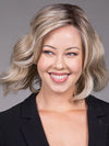 Model is wearing VERONICA in Butter Beer R | Dark Brown Base and Root that transitions smoothly into a buttery blonde, infused with creamy honey and toffee tones