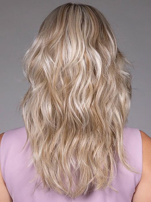 Model is wearing MARIE in BUTTERBEER R | Dark Brown Base and Root that transitions smoothly into a buttery blonde, infused with creamy honey and toffee tones