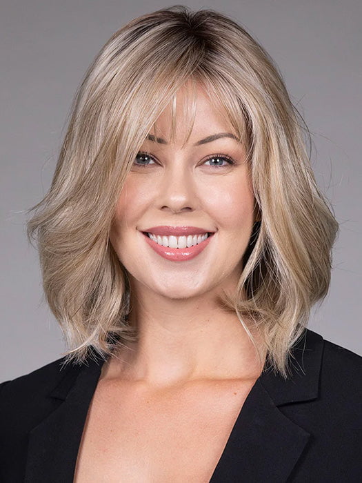 Model is wearing CATALINA in BUTTERBEER R | Dark Brown Base and Root that transitions smoothly into a buttery blonde, infused with creamy honey and toffee tones