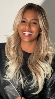  Sophia is wearing MELTED-MARSHMALLOW | Subtly Warm Dark Sandy Blonde Blend with Medium Brown Roots and Light Ash Blonde Tips and Highlights