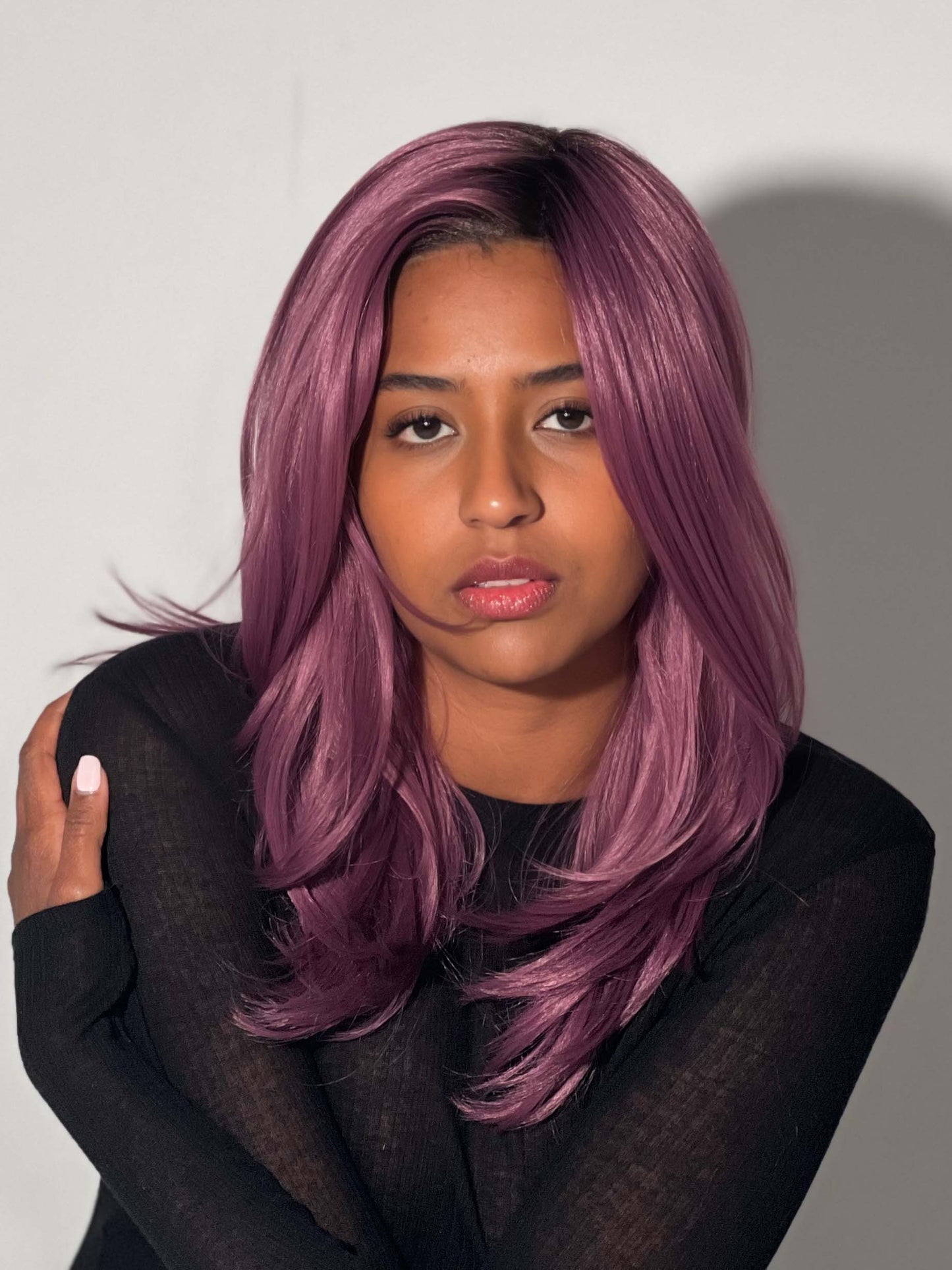 Sophia is wearing COSMO SLEEK by Rene of Paris in MAUVE BERRY | Smoky Fused Pale Violet Base with Medium Brown Roots
