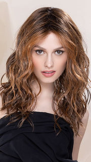 Model is wearing SERENA in CHESTNUT SHADED 830.31.6 | Medium Brown Blended with Light Auburn and Light Reddish Auburn with Dark Brown Blend with Shaded Roots