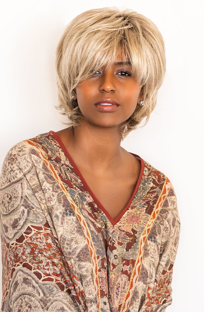 Sophia is wearing Sky by Noriko in exclusive color Arabian Sand Blonde