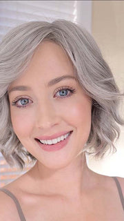 Steph B. wearing JANUARY by JON RENAU in color 56F51 OYSTER | Light Grey with 20% Medium Brown Front, graduating to Grey with 30% Medium Brown Nape