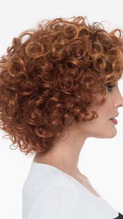 With a full head of bouncy curls, Kenya Wig by Envy has chin-length 'do gives you volume for days
