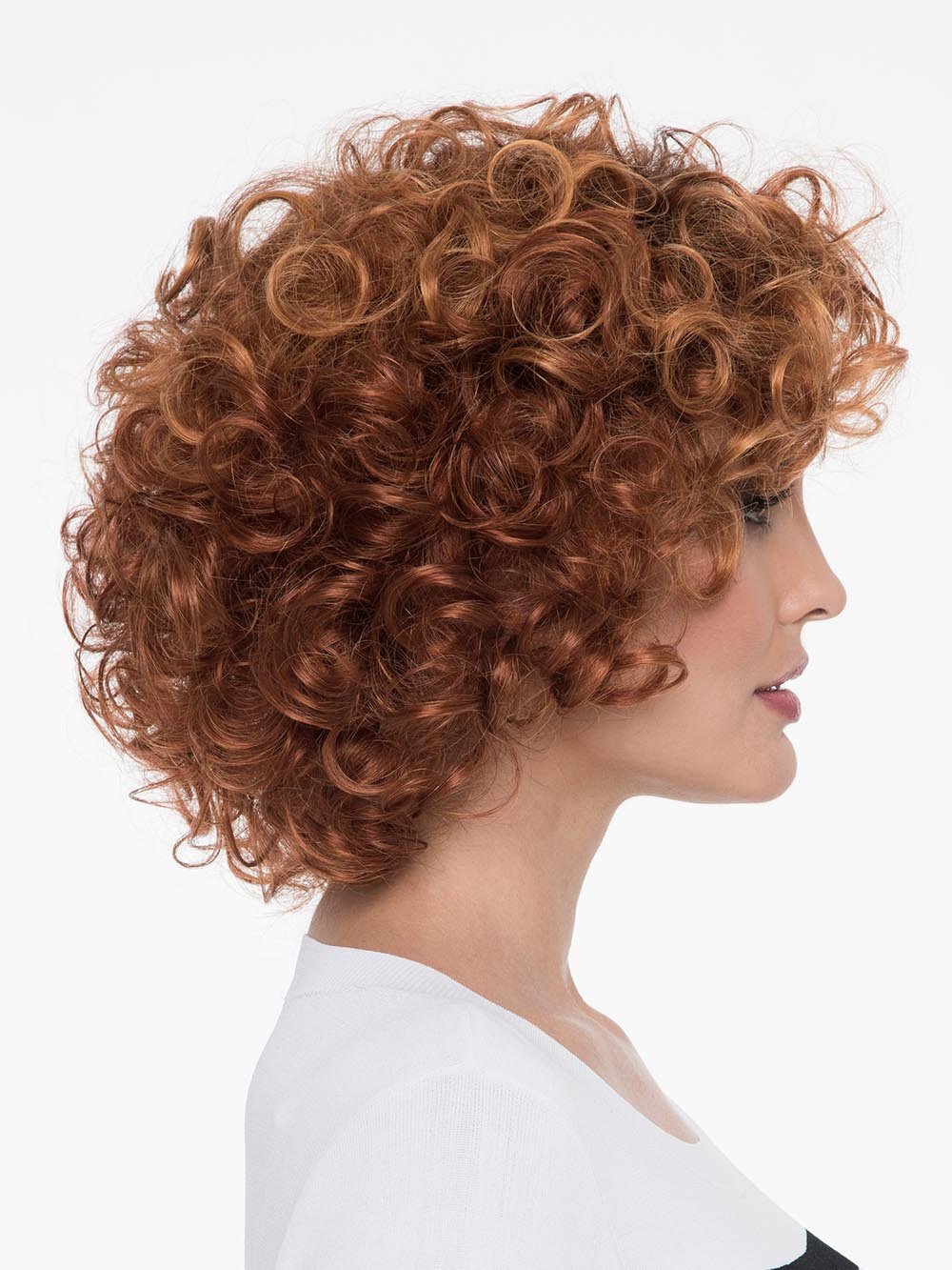 With a full head of bouncy curls, Kenya Wig by Envy has chin-length 'do gives you volume for days