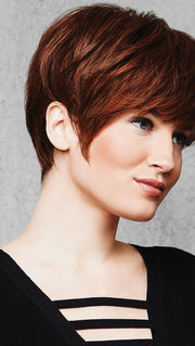 A classic “boy cut”, the SHORT TEXTURED PIXIE CUT Wig by Hairdo features textured bangs and all over precision tapered layers that blend into a neck-hugging nape
