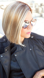 KAI by RENE OF PARIS in MELTED-MARSHMALLOW | Subtly warm dark sandy blonde blend with medium brown roots and light ash blonde tips and highlights