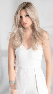 Made with heat-friendly synthetic fiber, this stunning wig is the longest wig available in the Hair Society Collection