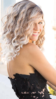 A youthful fun style that features long, playful spiral curls