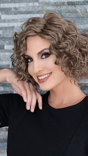 A textured bob made with a blend of human hair and heat-friendly synthetic fibers