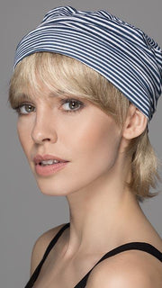 Mint by Ellen Wille is an elastic made band with hair around the circumference.