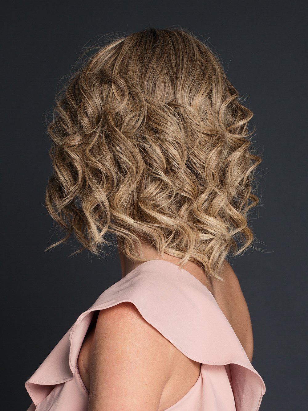CARRIE by JON RENAU in 24BT18S8 | Medium Natural Ash Blonde and Light Natural Gold Blonde Blend, Shaded with Medium Brown  (This piece has been styled and curled)