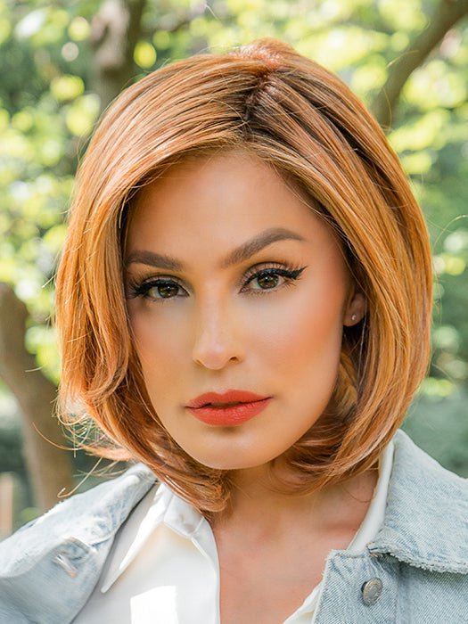 Upstage by Raquel Welch in color RL29/33SS ICED PUMPKIN SPICE | Strawberry Blonde shaded with Dark Red-Brown