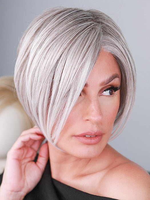 Roxie wigs.com model wearing Ignite by Jon Renau in color 56F51 OYSTER MUSHROOMS | Grey/Platinum Blend with 5% Dark Gold Brown Front, Grey with 30% Medium Gold Brown Nape
