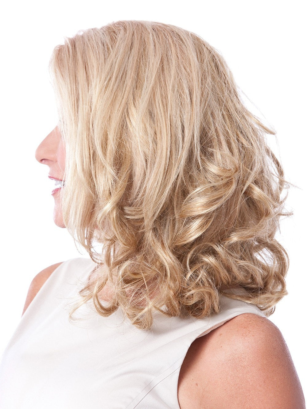 Clip-in curly hair extension with 3 layers of hair that gives you fabulous, fuller hair in an instant