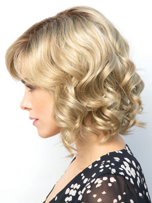 The Reign Wig by Amore is a short layered bob with tousled waves and a side-swept fringe