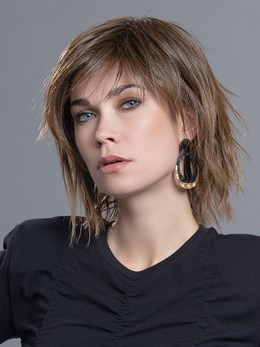 A unique bob that features beach waves with a razor-cut finish