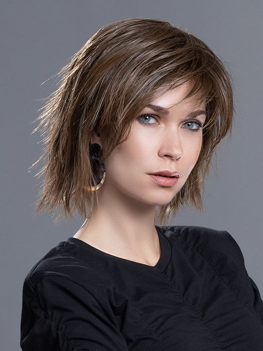 The mini lace front allows for a natural lift in the front while showing off the blunt fringe
