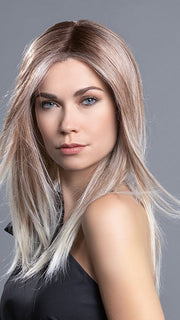 This long layered style is an absolute stunner   | This wig has been heat styled