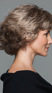 A a fresh silhouette of all-over curled layers are just right with a light and luxurious hand-knotted top