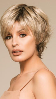 This versatile hair style features a premium synthetic fiber and a monofilament crown