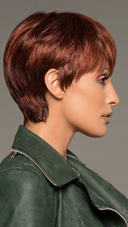 Layers on the top and sides are longer and texturized to create a light, feathered look. Use a styling creme to amplify the layers